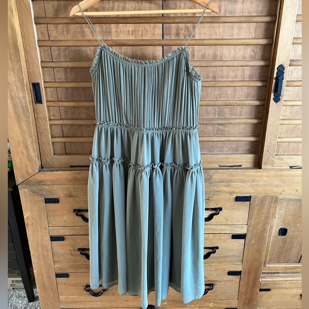 Light green spaghetti strap dress. 6 petite. Only worn once. Great condition.
